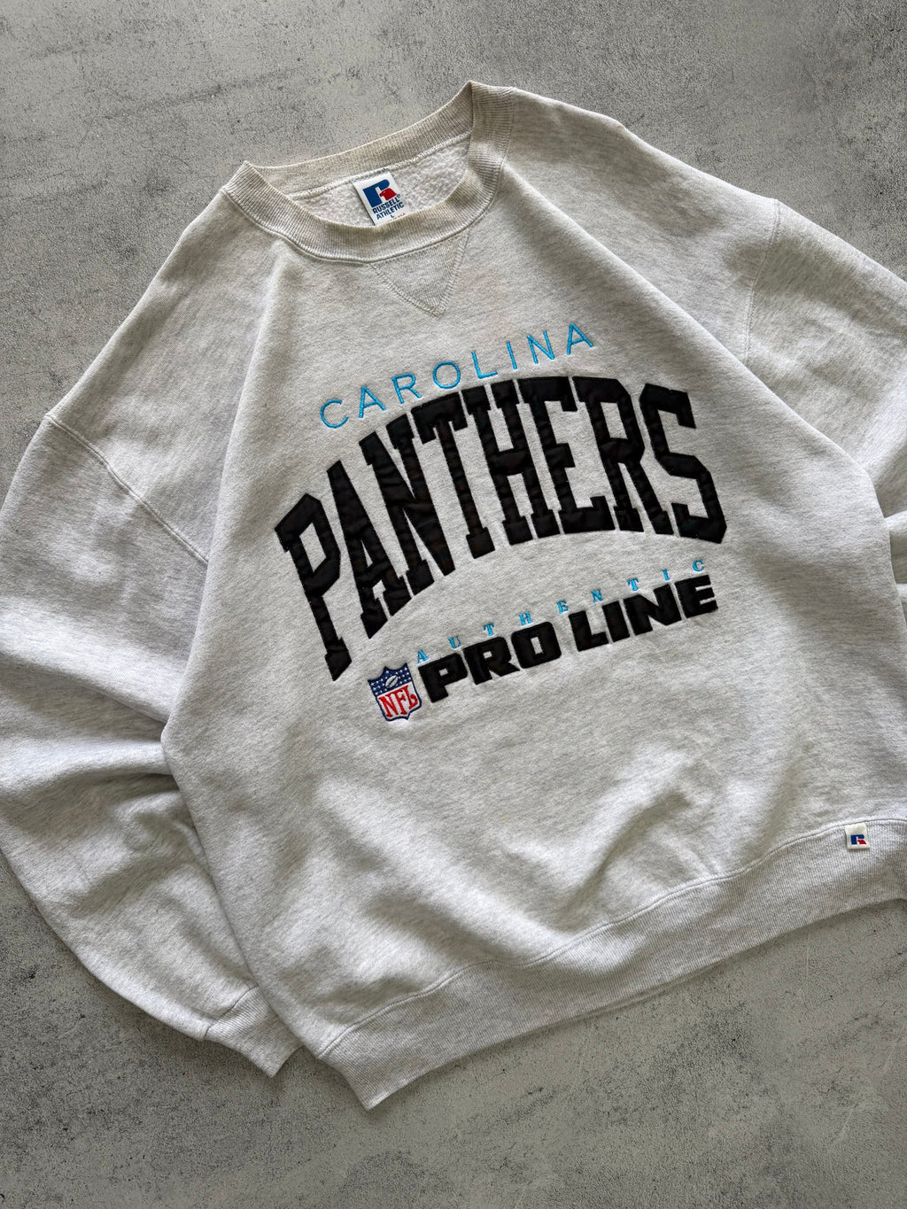 Vintage Russell Athletic Carolina Panthers NFL Sweatshirt - L