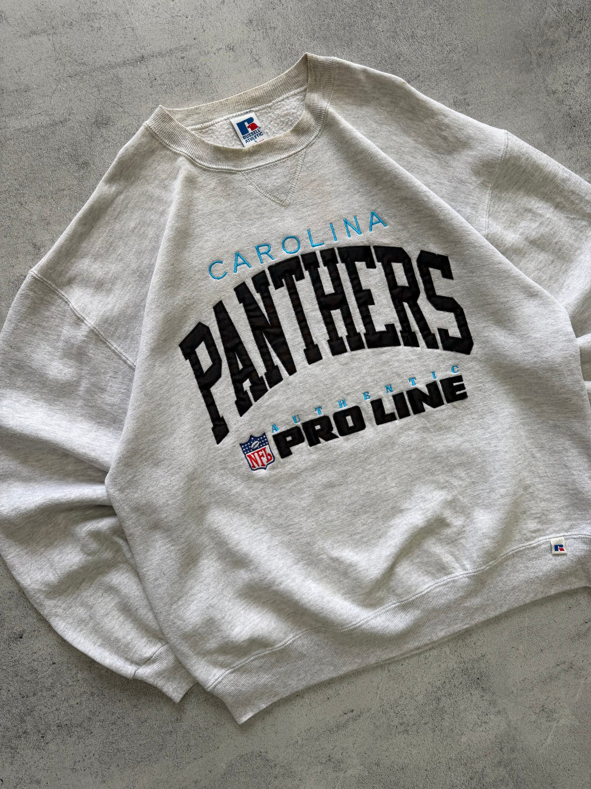 Vintage Russell Athletic Carolina Panthers NFL Sweatshirt - L